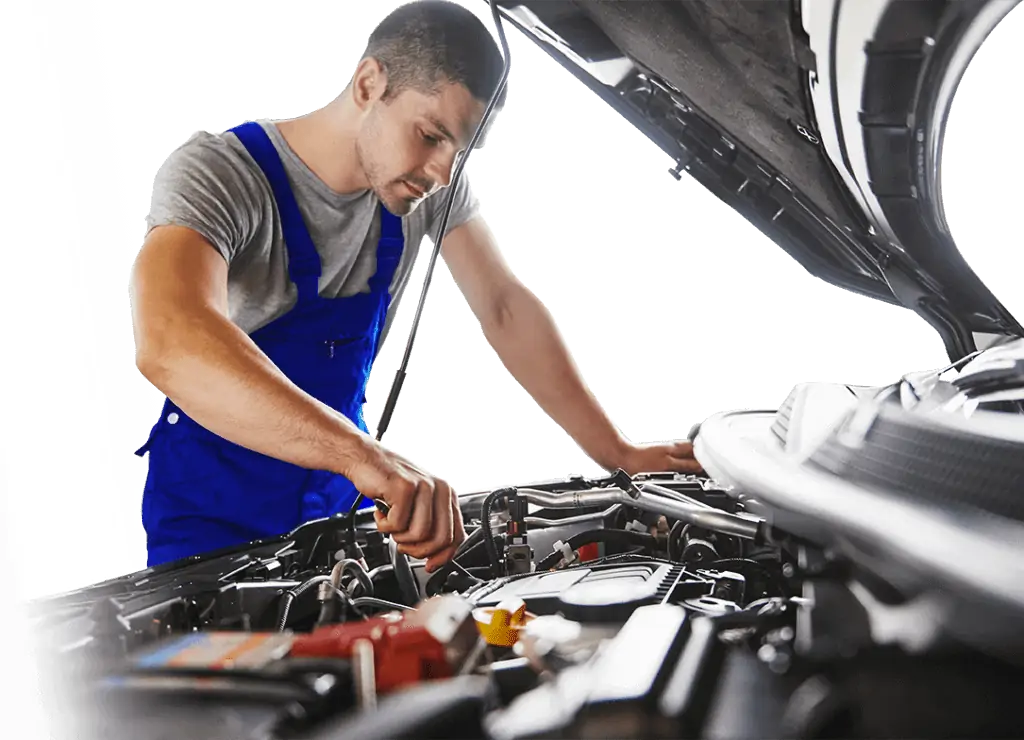 mechanic working on a car with an extended car warranty