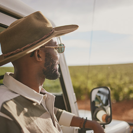 driver-enjoying-a-protected-road-trip